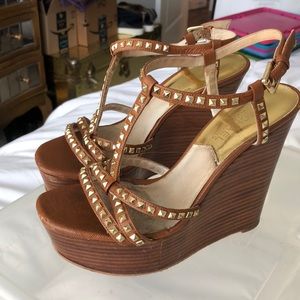Michael Kors brown gold studded wedges.